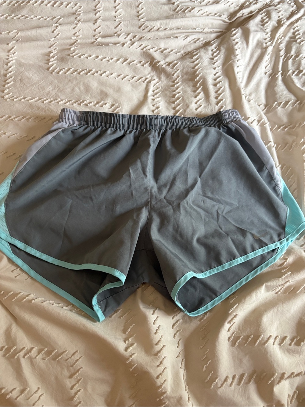 Nike Women's Gray Athletic Shorts with Light Blue Trim